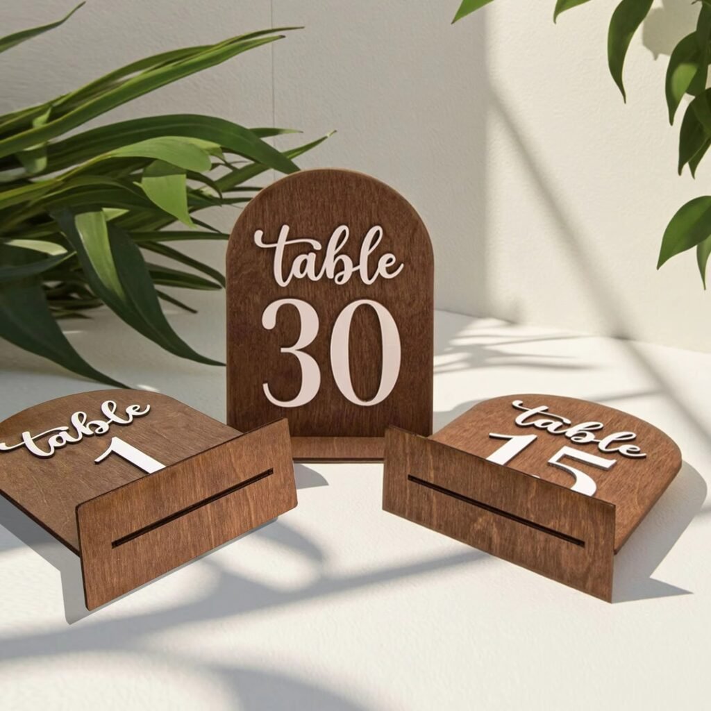 Wooden arch table number signs for wedding reception table decor and elegant event seating display