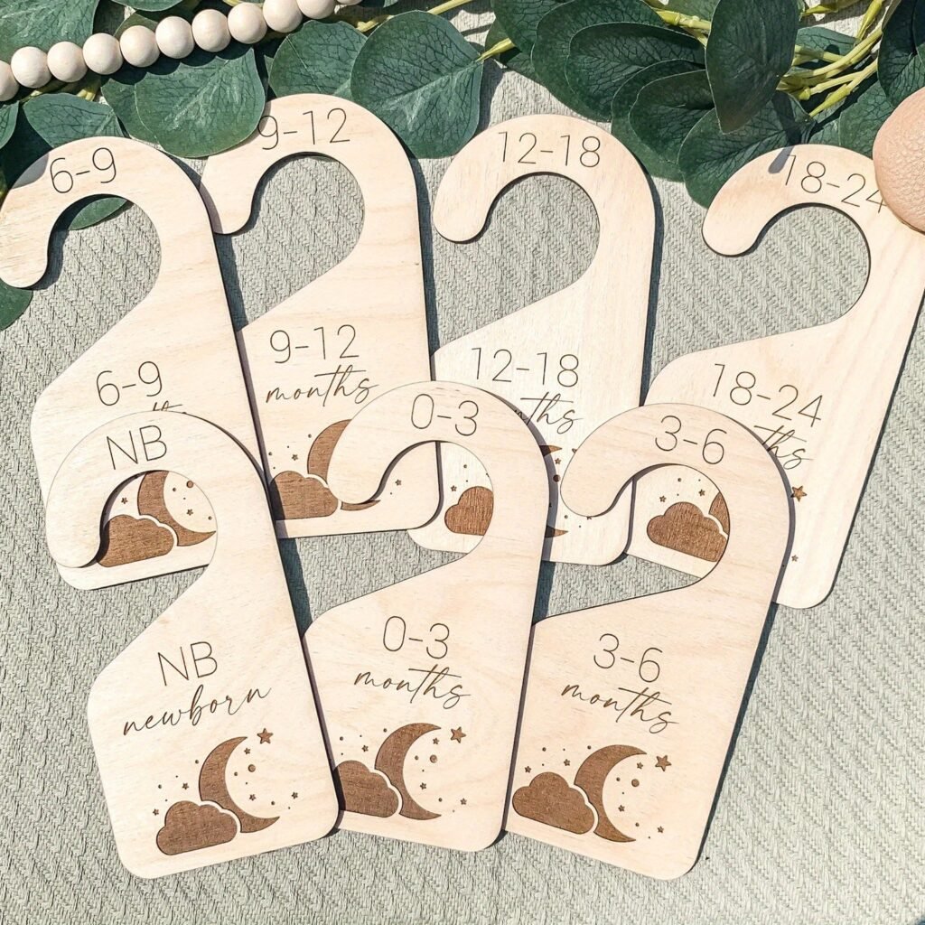 Wooden baby closet dividers with moon and cloud design