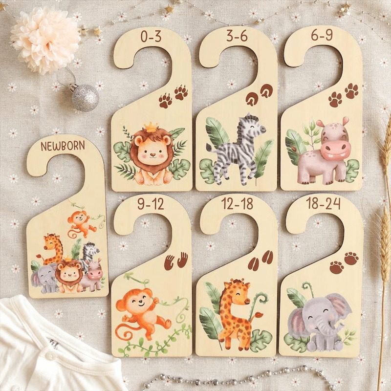 Wooden baby closet dividers with safari animal design for nursery wardrobe organization and baby clothes sorting